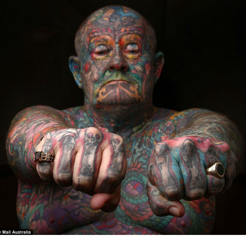 The reformed gangster covered every inch of his body in tattoos